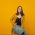 glamorous-female-model-with-straight-hair-sitting-SY82H9H.jpg
